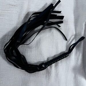 Adult flogger.  Petite size.  Good for beginners and light play.  17”.  Black
